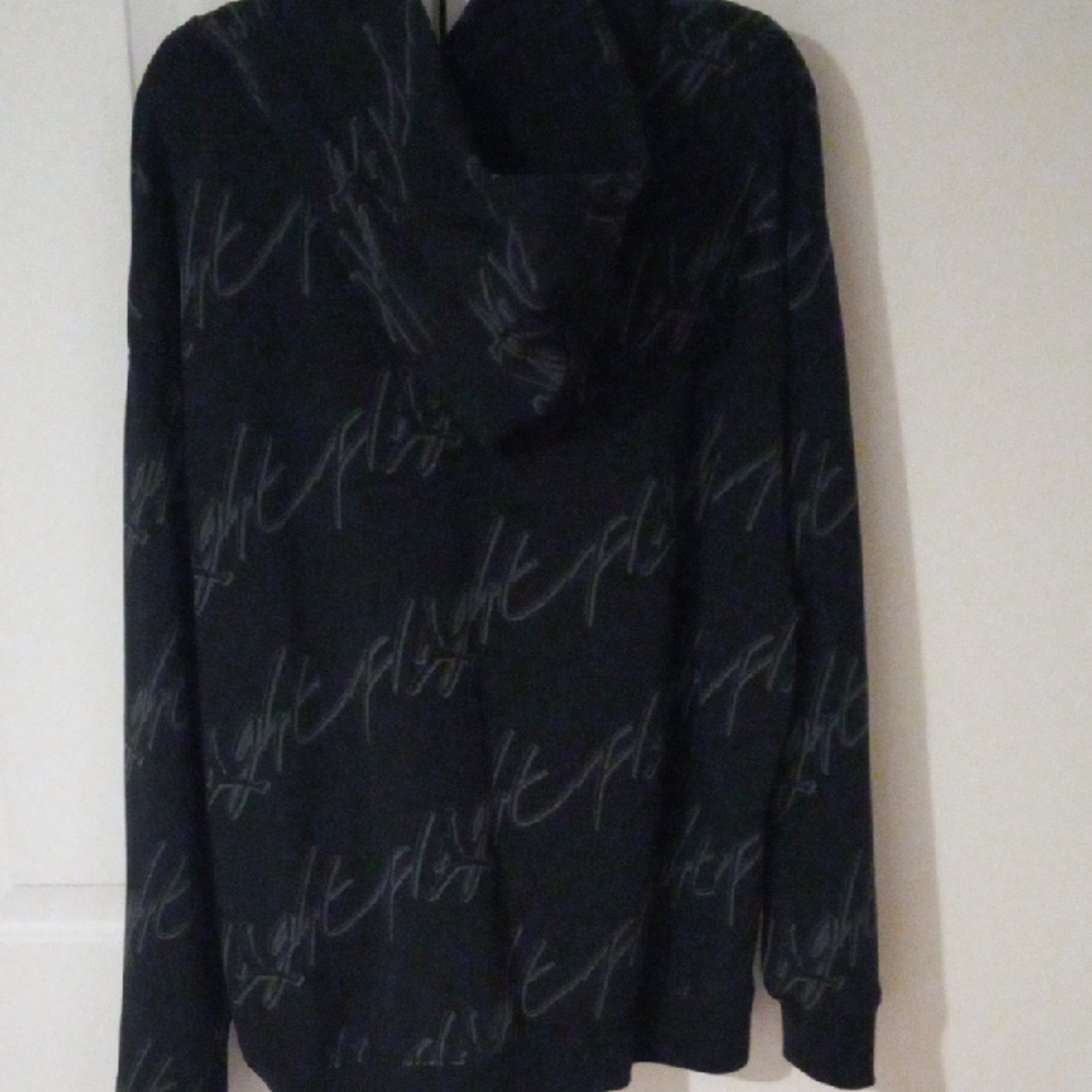Jordan Black V-Neck Sweater with Subtle Script Pattern - Picture 2 of 5
